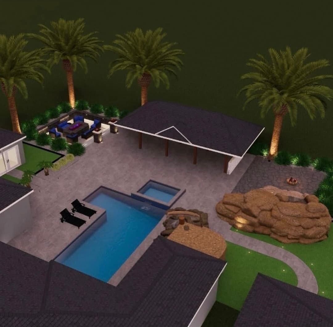 Aerial view of a modern backyard with a pool, patio, and palm trees.
