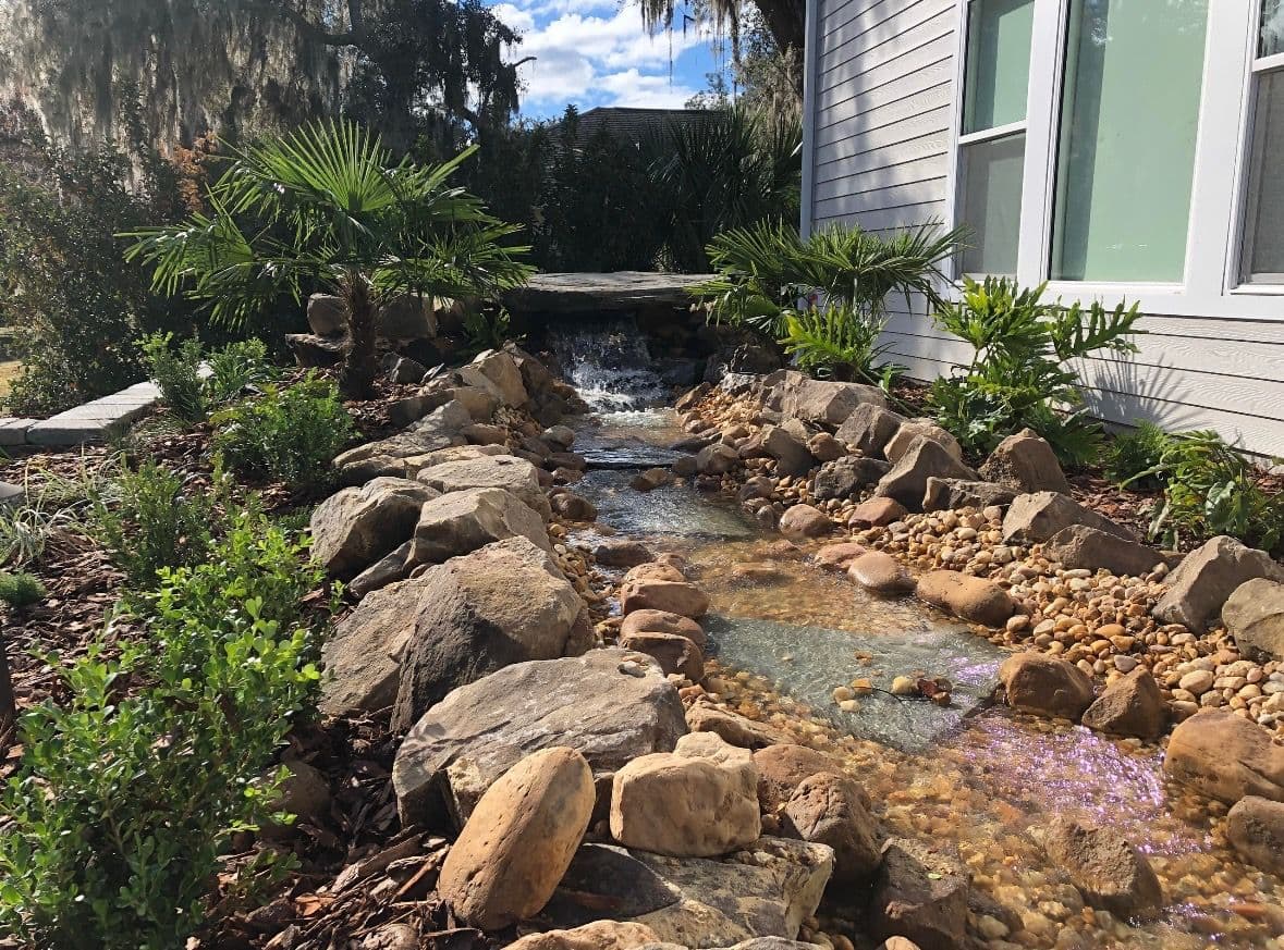 Serene Garden Oasis with Flowing Stream image